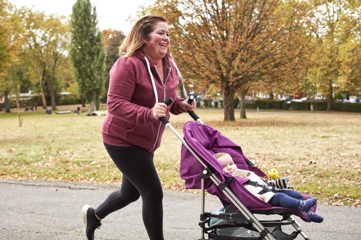 Woman running with a pushchair (image by Sport England)