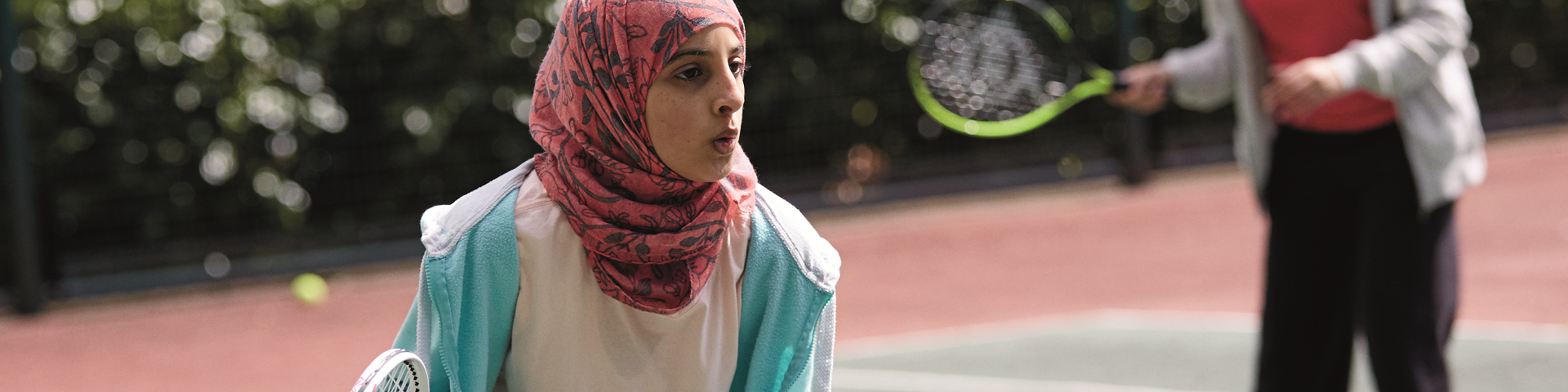 Women playing tennis (image by Sport England)