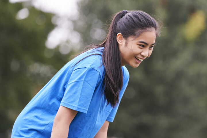 Girl playing rugby