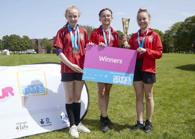 Three winners at the school games with trophy