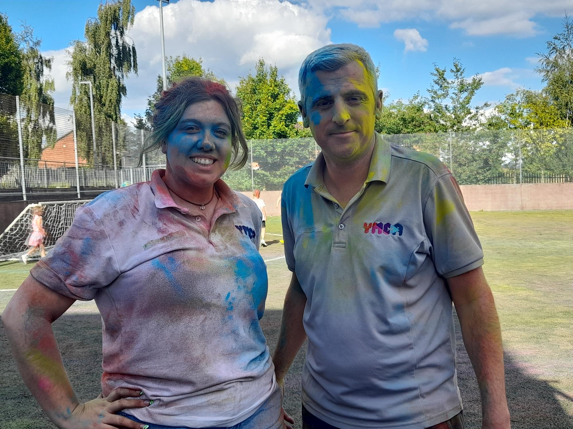 YMCA staff Tegan and Paul smiling.